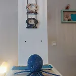 Octopus Garden, Koralli Apartmán Travliata